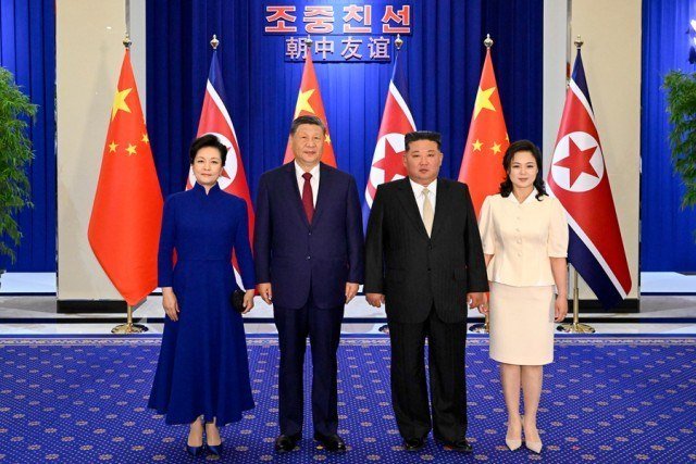 习近平承诺支持金正恩 访问朝鲜期间重申立场
