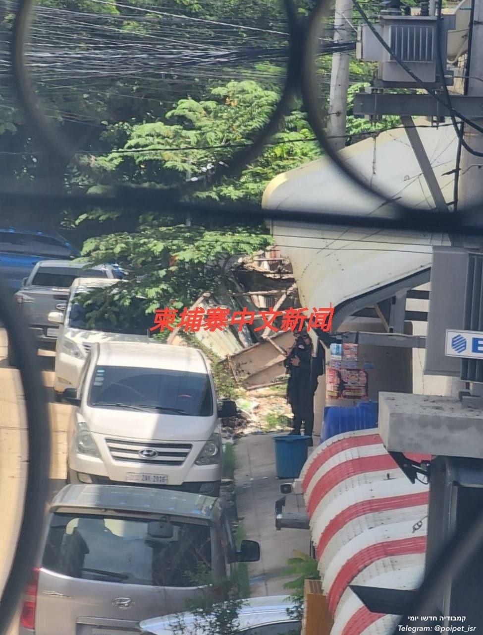 波贝警方突击搜查建筑 现场禁止记者拍照引发质疑