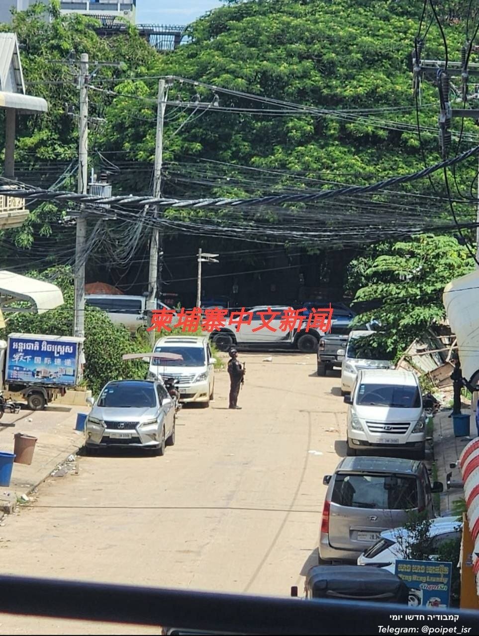 波贝警方突击搜查建筑 现场禁止记者拍照引发质疑