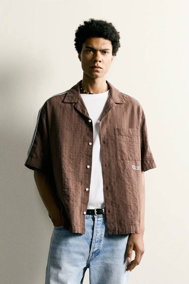 Zara柬埔寨新款条纹刺绣衬衫 售价19.99万瑞尔