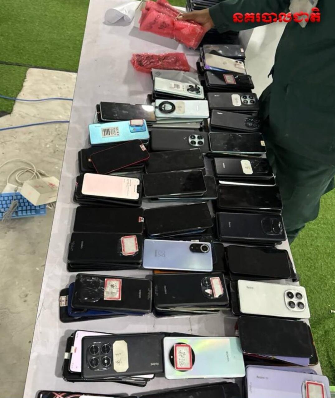 波贝涉诈别墅取证调查 警方查获245部手机及大量证件