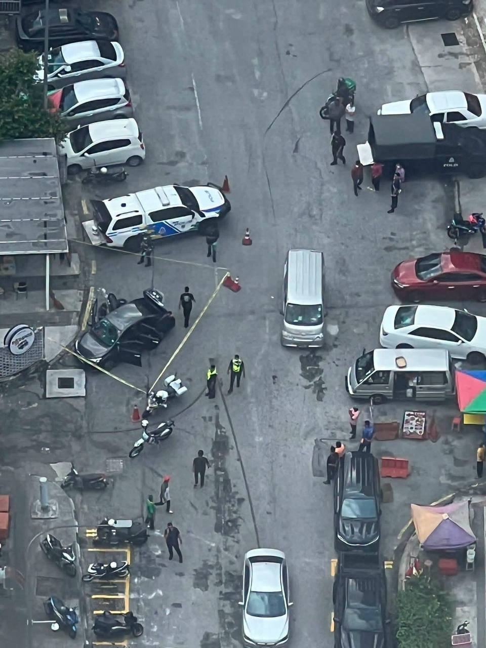 吉隆坡路边轿车惊现不明尸体 警方已介入调查