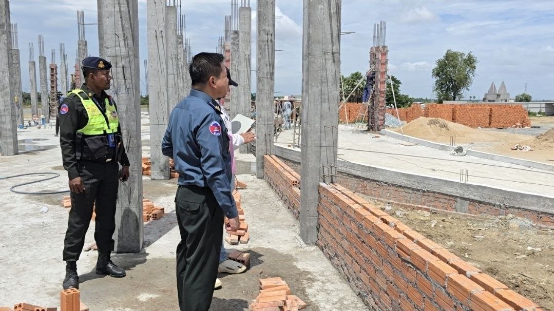 实居省宪兵司令孟顺视察了新建宪兵司令部办公大楼的施工进度,要