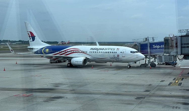 曼谷洪灾致航班延误 马航中转旅客行程受阻
